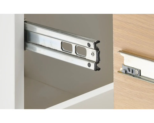 Paire de glissières de tiroir en métal dans un meuble