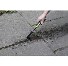 Désherbeur de joints utilisé pour enlever les mauvaises herbes entre les pavés