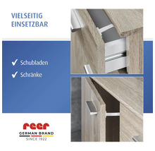 reer Kindersicherung für Schubladen und Schränke an Möbeln mit Holzoberfläche. reer Logo.