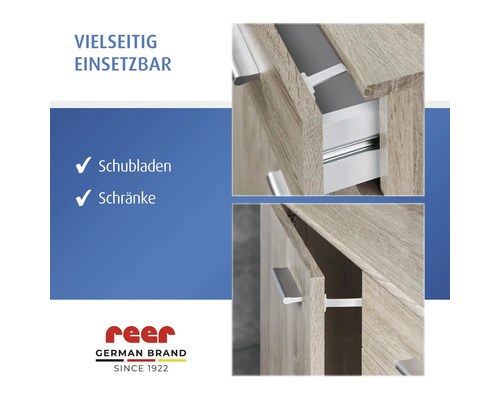 reer Kindersicherung für Schubladen und Schränke an Möbeln mit Holzoberfläche. reer Logo.
