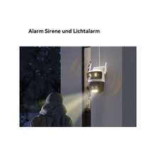 Caméra de surveillance avec sirène d'alarme et alarme lumineuse détectant une personne la nuit.