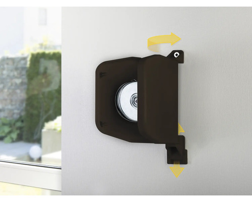 Enrouleur de sangle pivotant pour volets roulants en brun, fixé au mur avec des flèches illustrant le sens du mouvement.