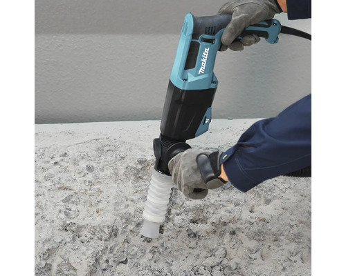 Burineur Makita avec aspiration de poussière utilisé sur une surface en béton. Makita Logo.