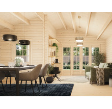 Intérieur lumineux d'un abri de jardin en bois avec coin repas, salon et grandes baies vitrées sur le jardin.
