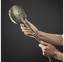 Douchette à main tenue à la main avec raccord de flexible de douche