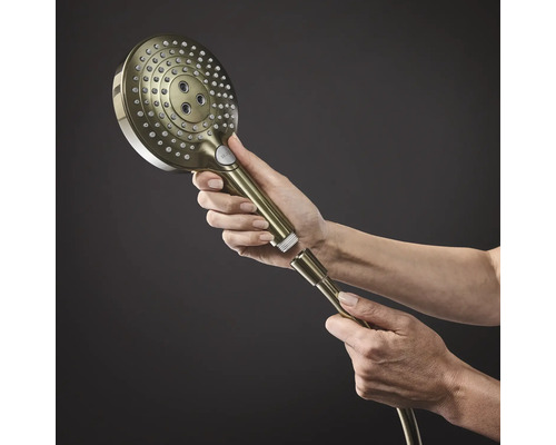 Douchette à main tenue à la main avec raccord de flexible de douche