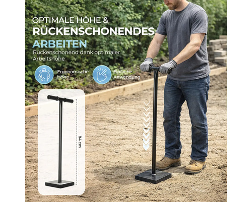 Dame de sol manuelle en métal d'une hauteur de 84 centimètres, utilisée par une personne pour compacter la terre.