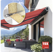 Cheville TOX pour la fixation de stores dans une façade avec isolation illustrée dans un exemple d application sur une maison