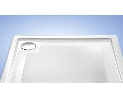 Vue détaillée d''un receveur de douche blanc avec écoulement