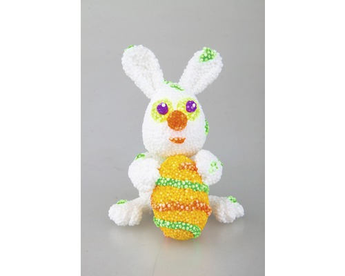 Dekorativer Osterhase mit Osterei