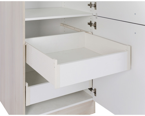 Armoire ouverte avec tiroirs