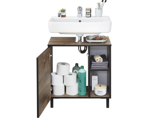 Meuble sous-lavabo avec placard ouvert et divers accessoires de salle de bain