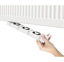 Ventilateur de radiateur placé sous un radiateur
