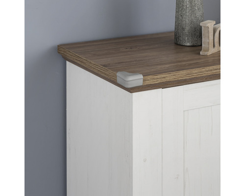 Eckenschutz an einem Holzmöbelstück