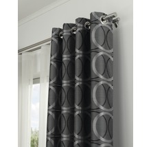 Dekorative Gardine mit Ösen und Kreismuster an einer Gardinenstange