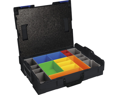 Boîte à outils ouverte avec des compartiments de différentes tailles