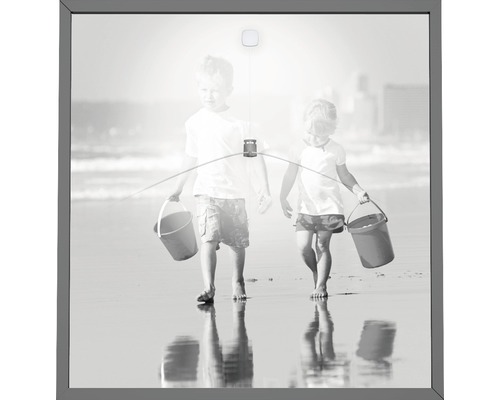 Leuchtbild mit dem Motiv zwei Kinder am Strand im Rahmen