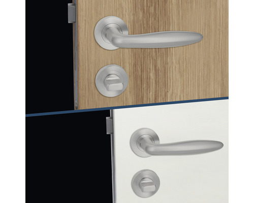 Garnitures de porte avec poignée de porte et rosace sur portes en bois