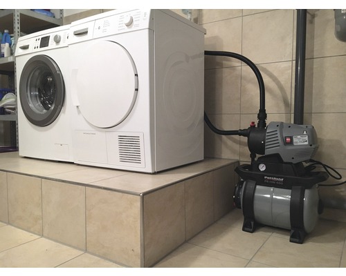 Machine à laver, sèche-linge et système d''alimentation en eau domestique dans la buanderie