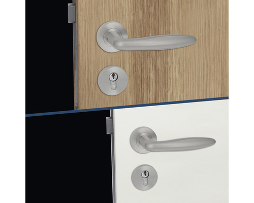 Garniture de porte avec poignée de porte et rosace de clé sur deux portes