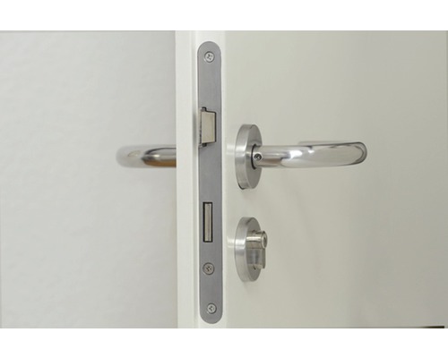 Gros plan d''une porte avec garniture de porte et serrure