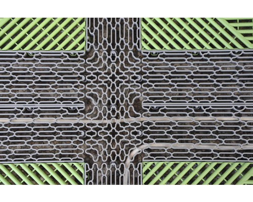 Detailaufnahme von verbundenen Rasengittersteinen aus Kunststoff