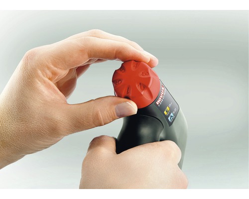 Eine Hand justiert einen Novus J-214 Light Tacker.