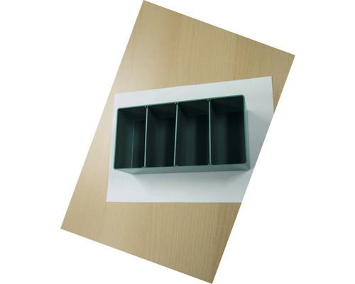 Insert en plastique avec quatre compartiments de rangement