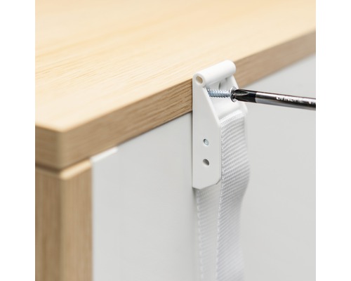 Fixation d''un store avec des vis