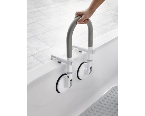 Barre d''appui pour montage sur baignoire avec ventouses et main de l''utilisateur