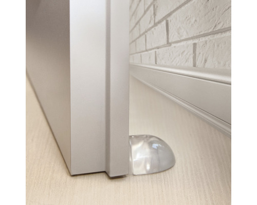 Butoir de porte en plastique au bas d''une porte