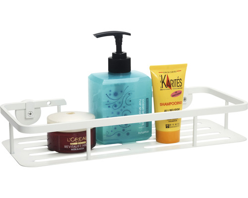 Étagère de douche blanche avec shampooing, gel douche et crème pour le visage