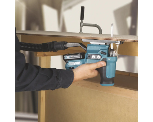 Fraiseuse à rainures Makita en utilisation pour le fraisage de rainures