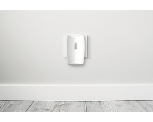 Elektrischer Lufterfrischer für die Steckdose an einer Wand