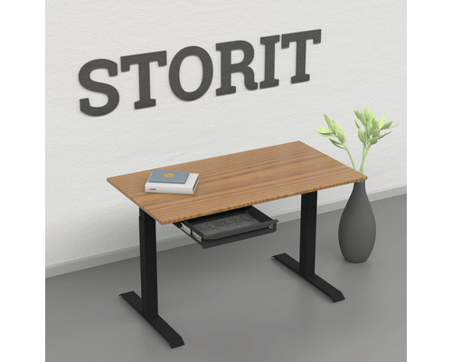 Bureau réglable en hauteur avec tiroir, livres et vase
