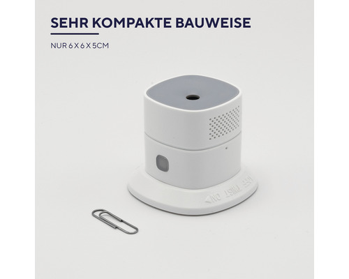 Weißer, tragbarer Lufterfrischer mit grauem Deckel und einer Büroklammer