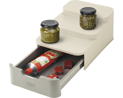 Organisateur de cuisine avec tiroir et deux étagères pour bocaux, tube et cubes de bouillon.