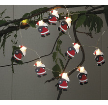 Santa Claus Lichterkette mit Figuren auf einem Baum