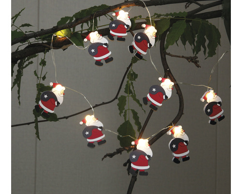 Santa Claus Lichterkette mit Figuren auf einem Baum