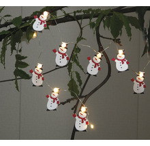 Guirlande lumineuse avec motifs de bonhomme de neige sur des branches