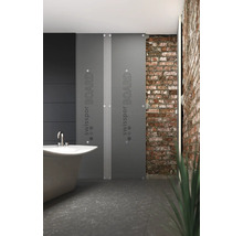 Salle de bains avec baignoire et panneaux d'isolation SwissPor Board devant un mur en briques