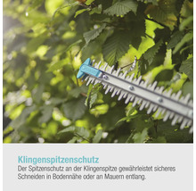 Heckenschere mit Klingenspitzenschutz beim Schneiden einer Hecke