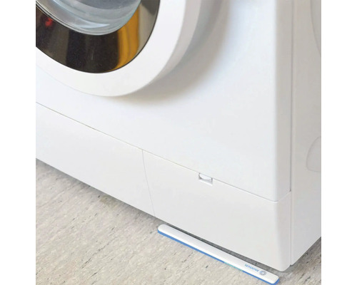 Machine à laver avec détecteur d''eau au sol