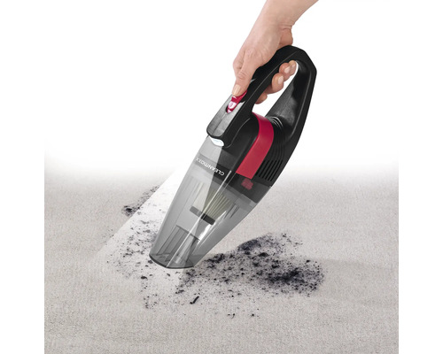 Handstaubsauger im Einsatz auf Teppichboden