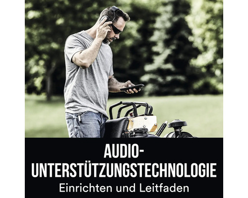 Homme avec protection auditive et smartphone à côté d''une plaque vibrante