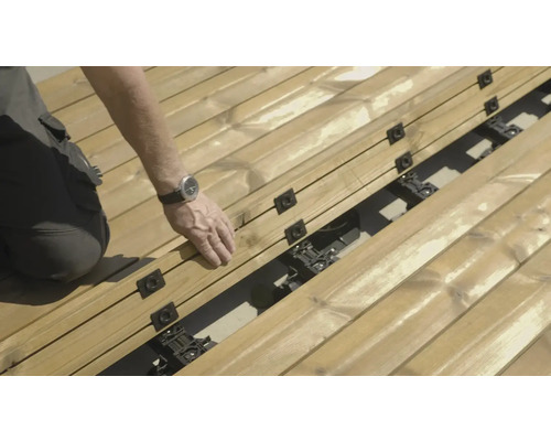 Pose de lames de terrasse avec un système de fixation invisible