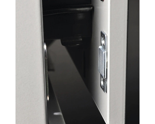 Vue détaillée d''un loquet magnétique sur un meuble