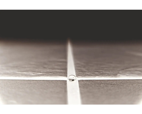 Carrelage avec croix de joint et goutte d''eau