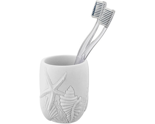 Brosses à dents dans un gobelet avec décor étoile de mer et coquillage