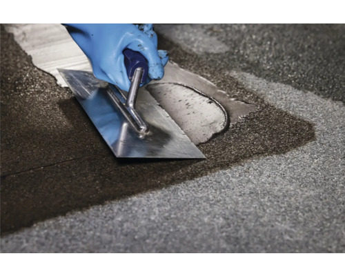 Verfugen von Pflastersteinen mit einem Fugenglätter